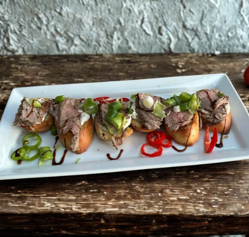 CREAMED TOPSIDE BEEF BRUSCHETTE